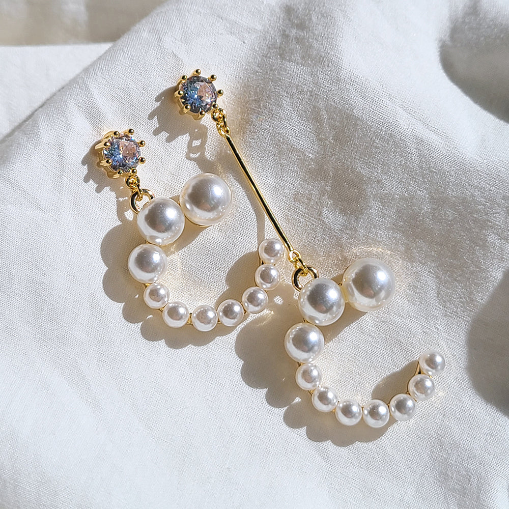 Asymmetric pearl drop earrings E0022